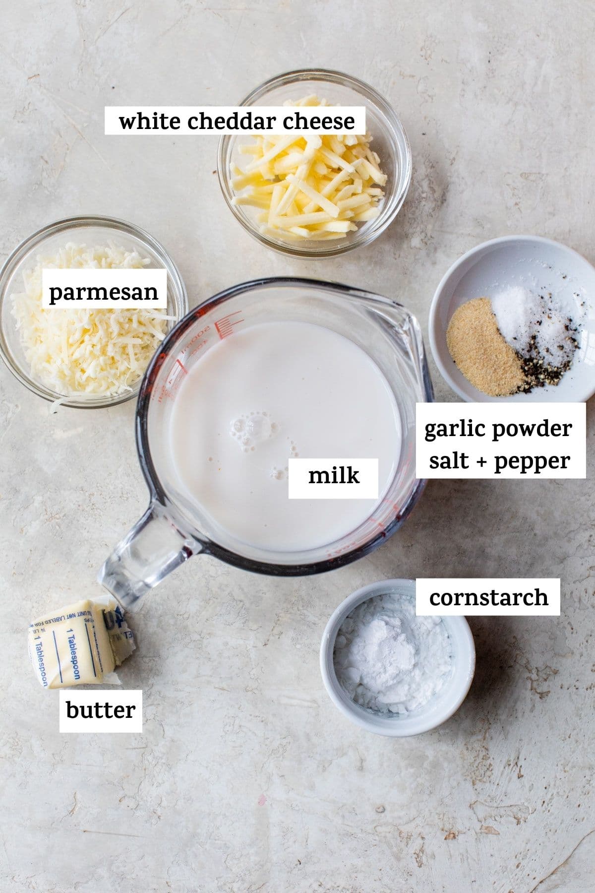 ingredients to make alfredo sauce like butter and shredded cheese