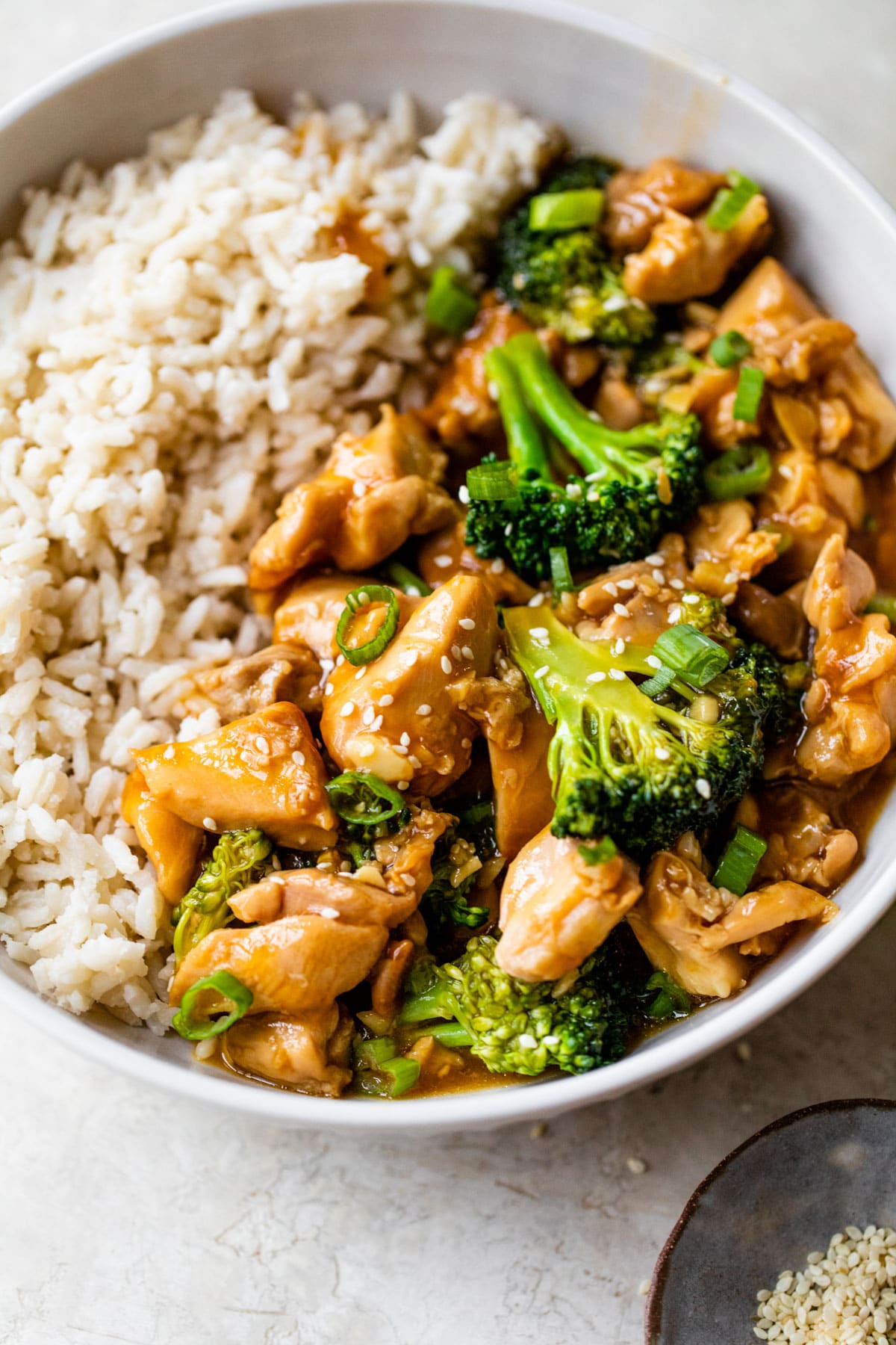 bowl of rice with chicken and broccoli