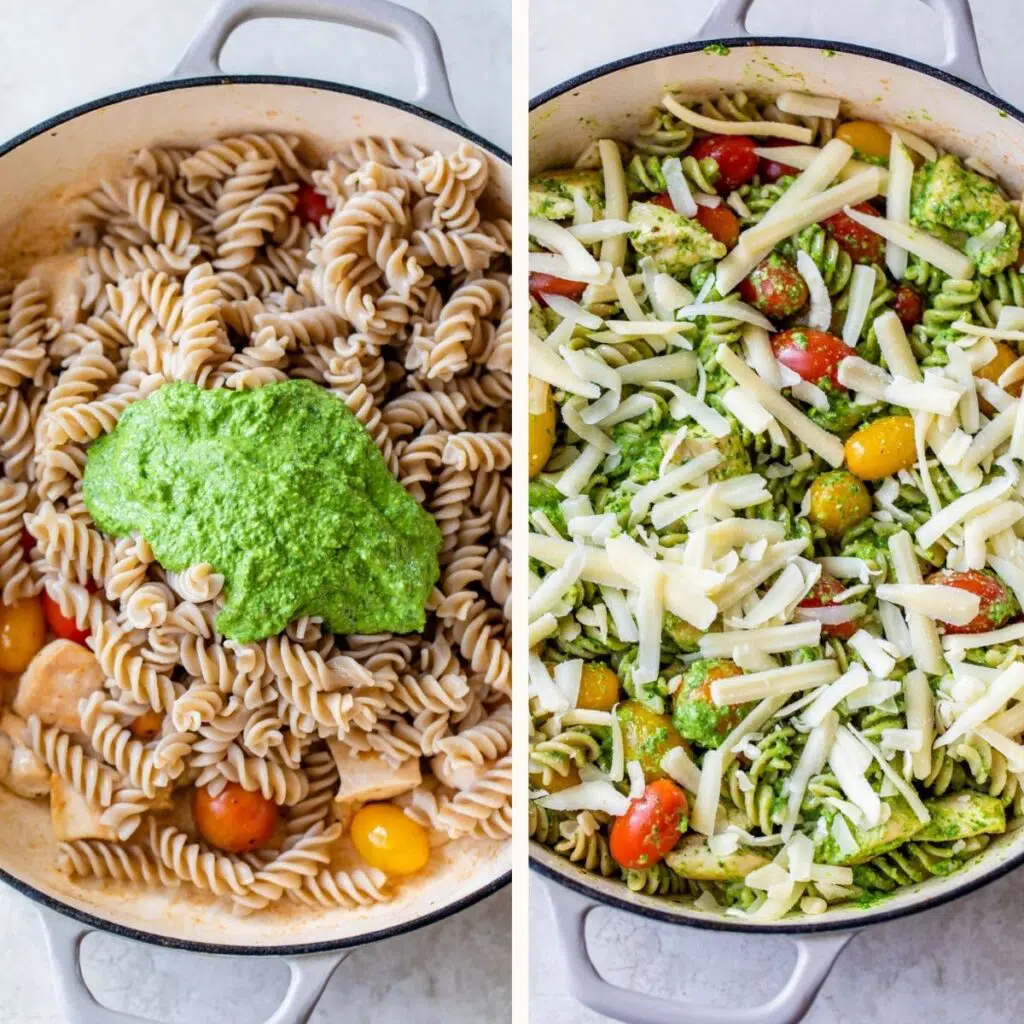 pasta in a skillet with pesto and shredded cheese