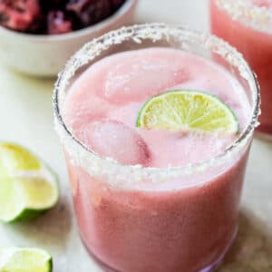 cherry margarita lined with shredded coconut