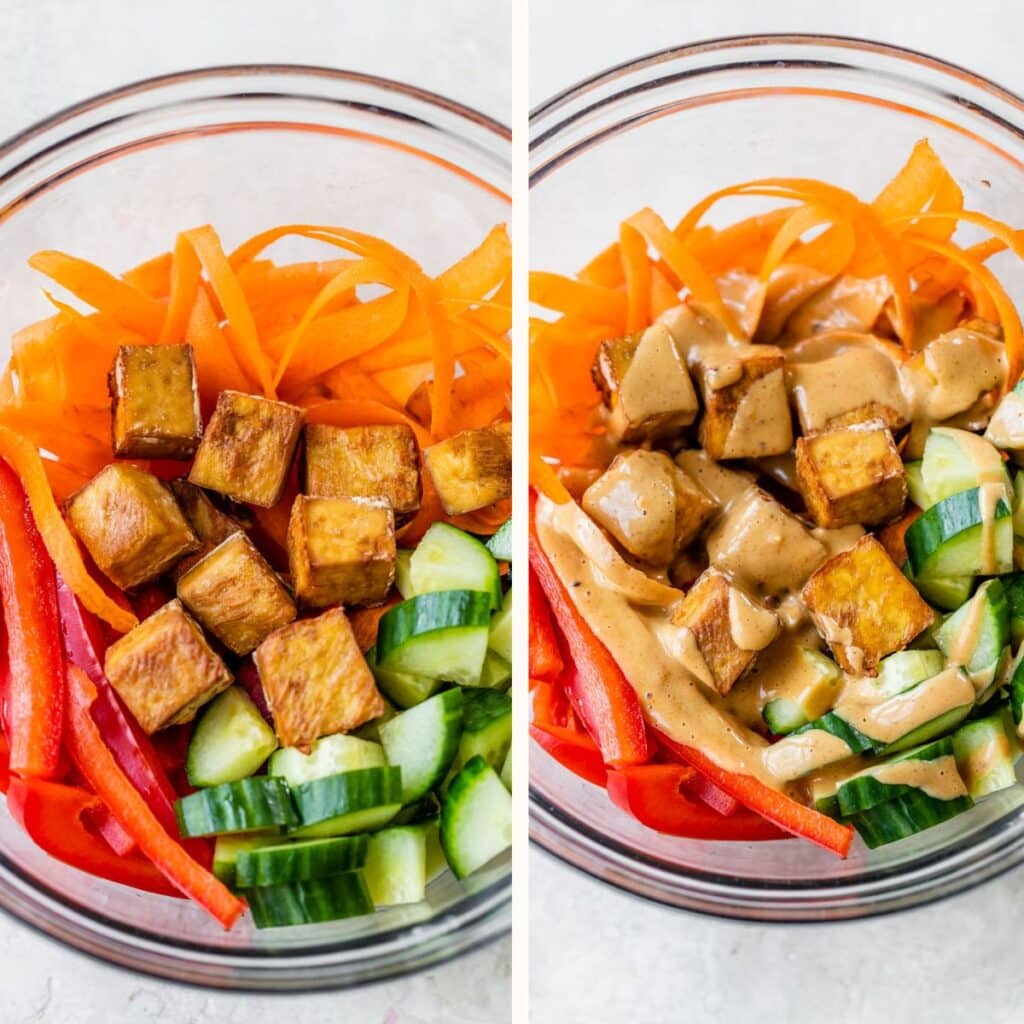 a glass bowl with sliced carrots, red bell pepper, cucumber and fried tofu