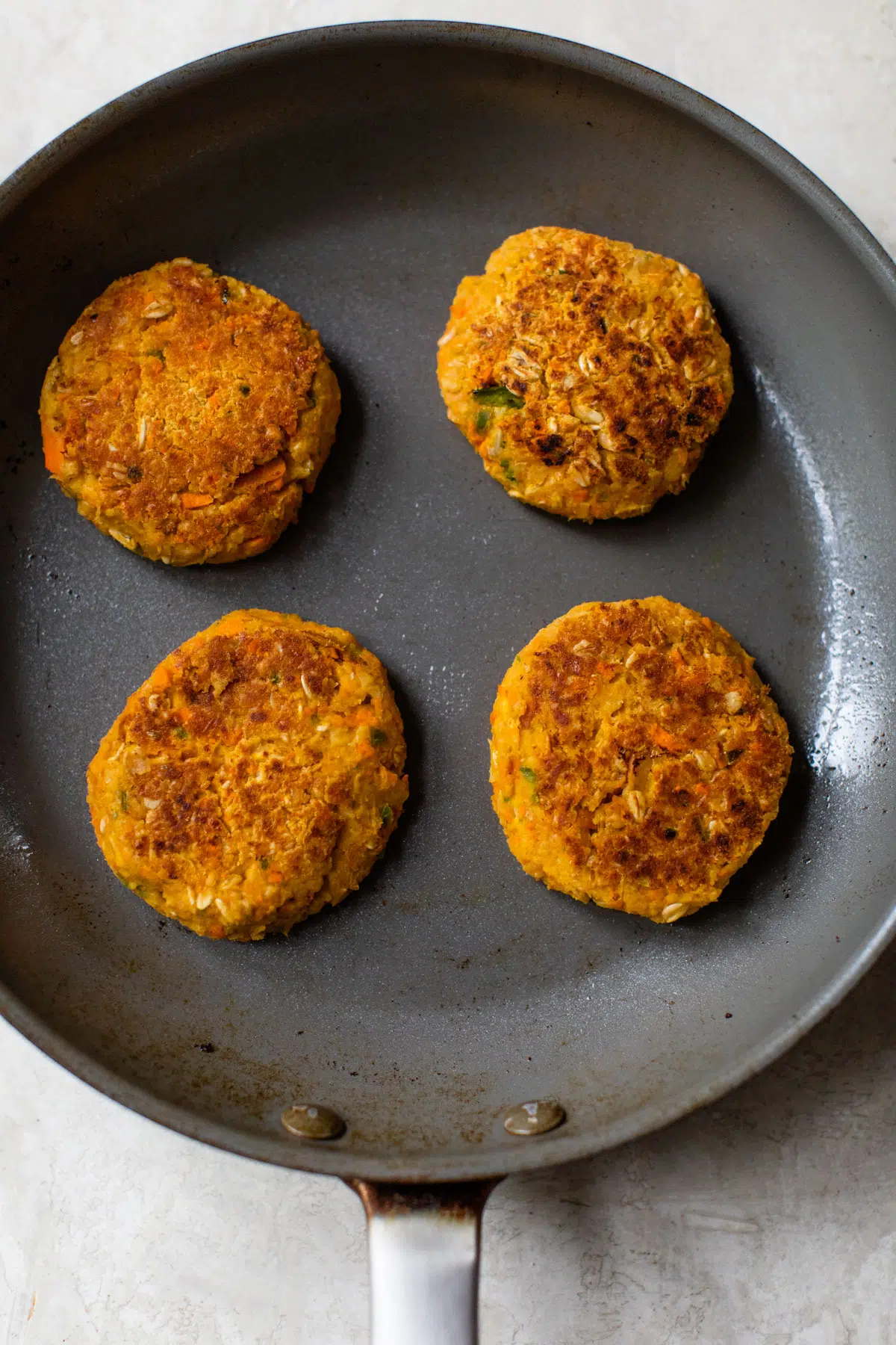 chickpea burgers in a skillet