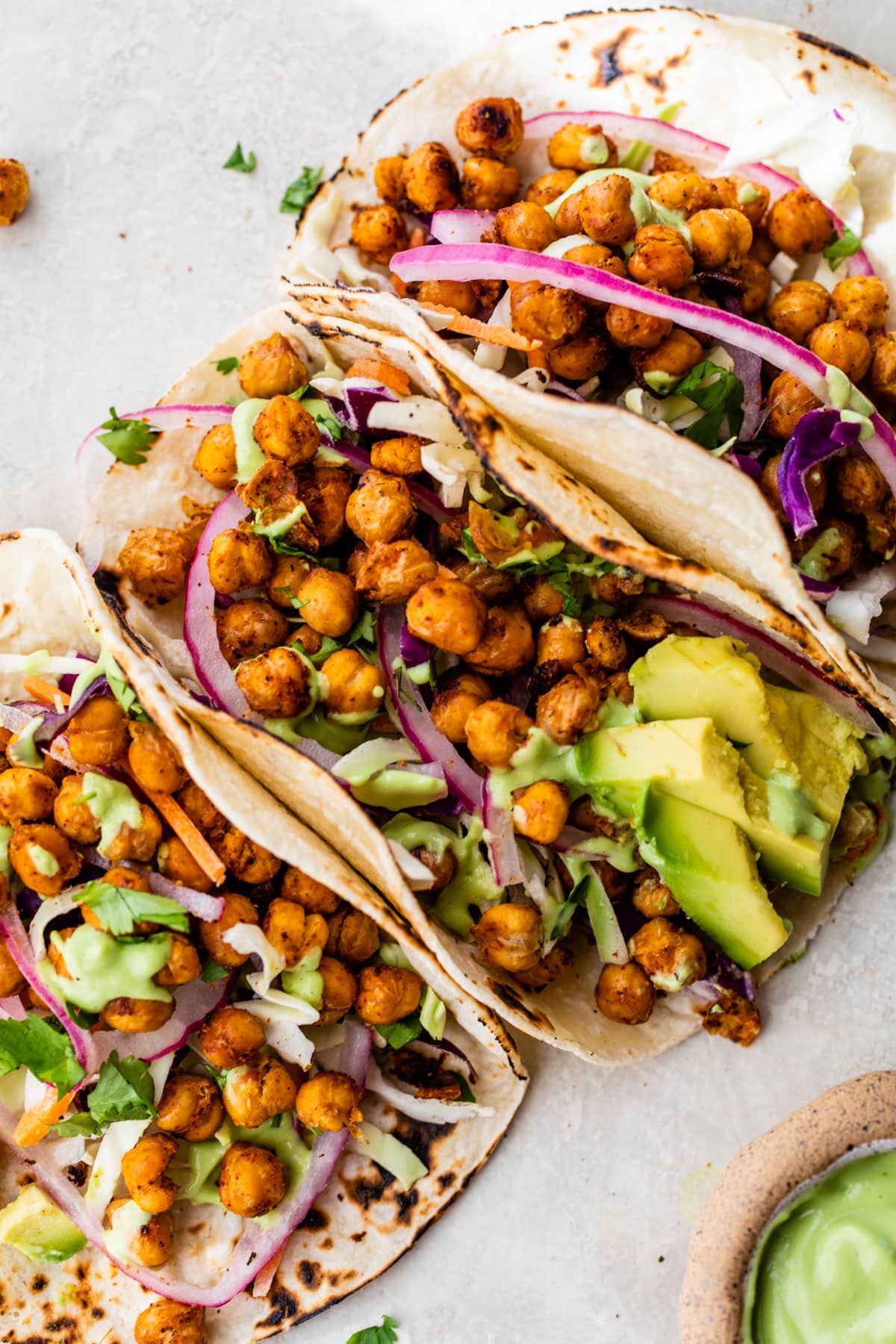 three tacos filled with chickpeas