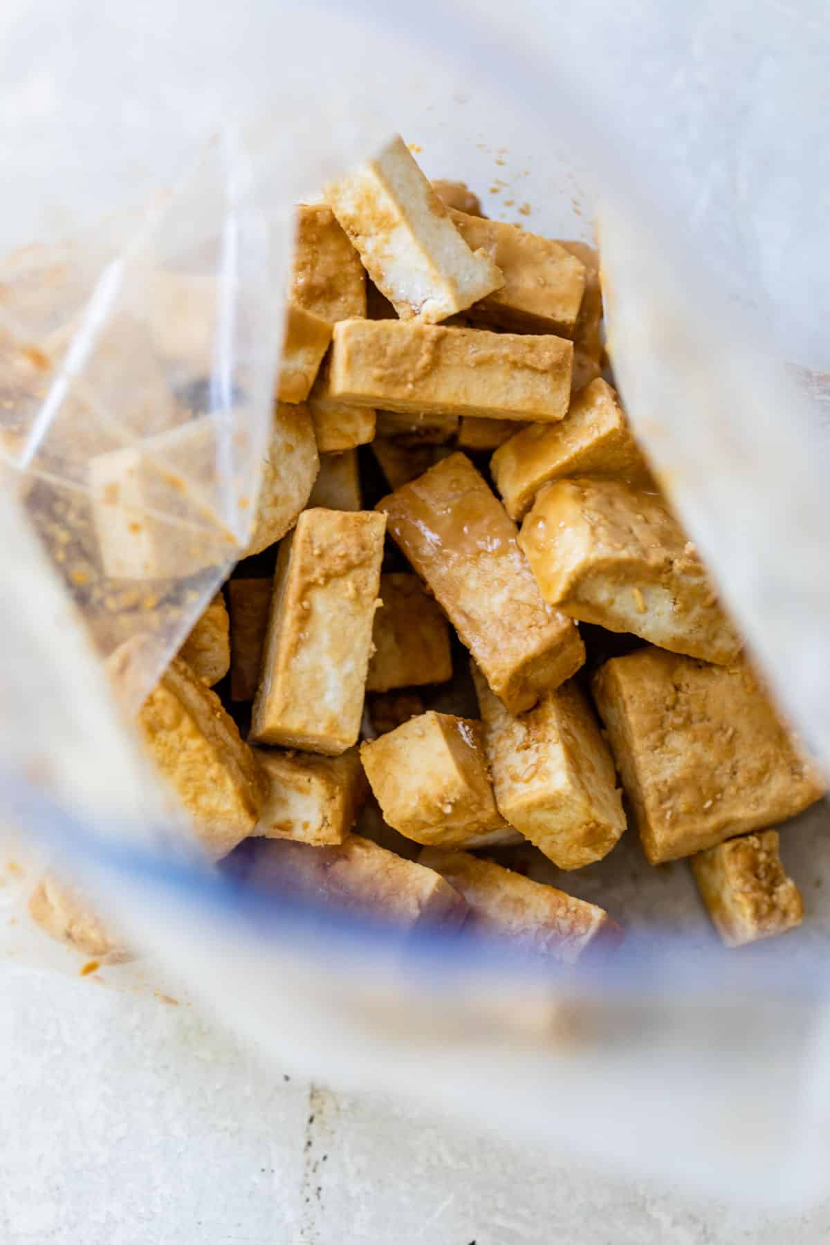 marinated tofu in a plastic bag