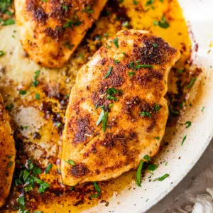 seared chicken breasts in a skillet