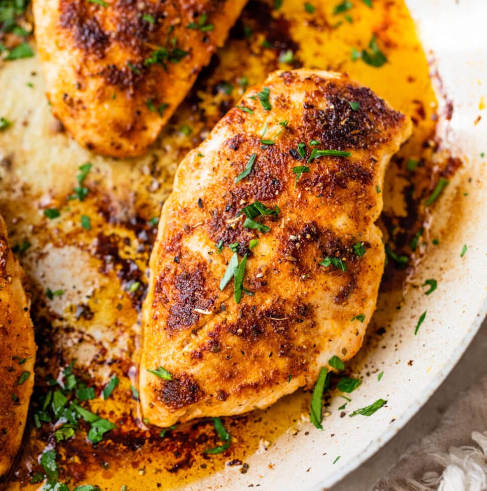 seared chicken breasts in a skillet