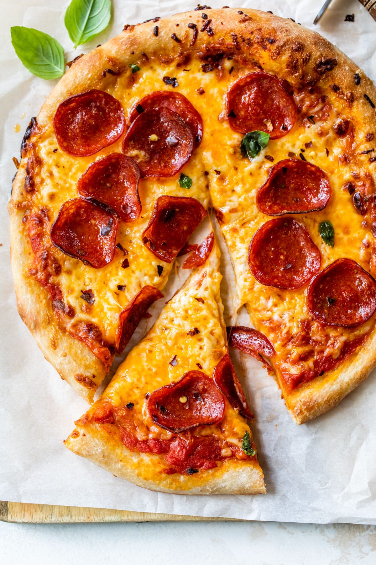 pepperoni pizza with a slice cut out