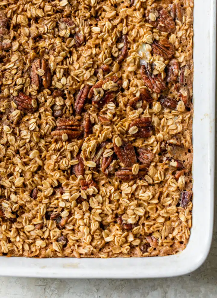 baked oatmeal with pecans in a casserole dish