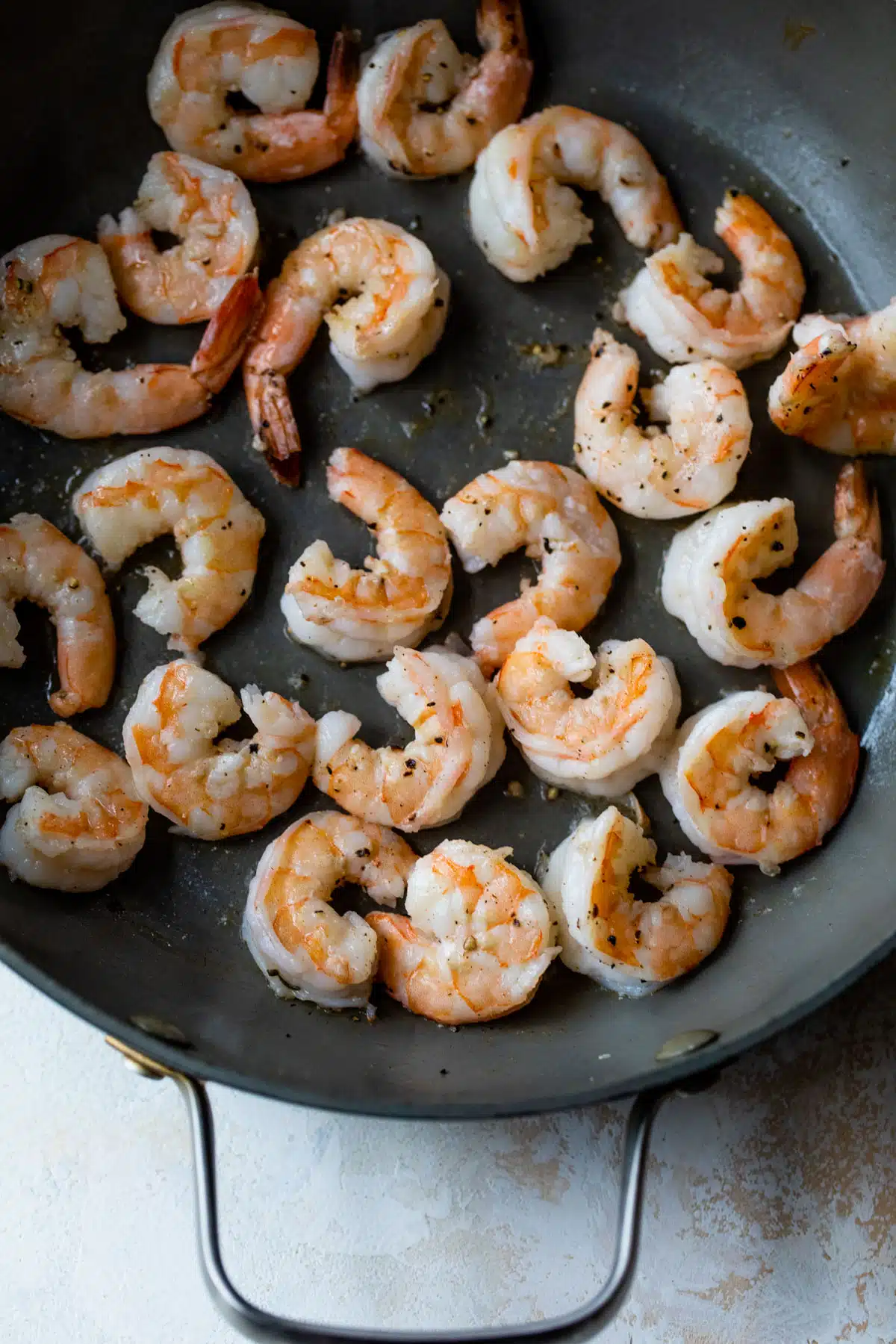 shrimp cooking in a skillet