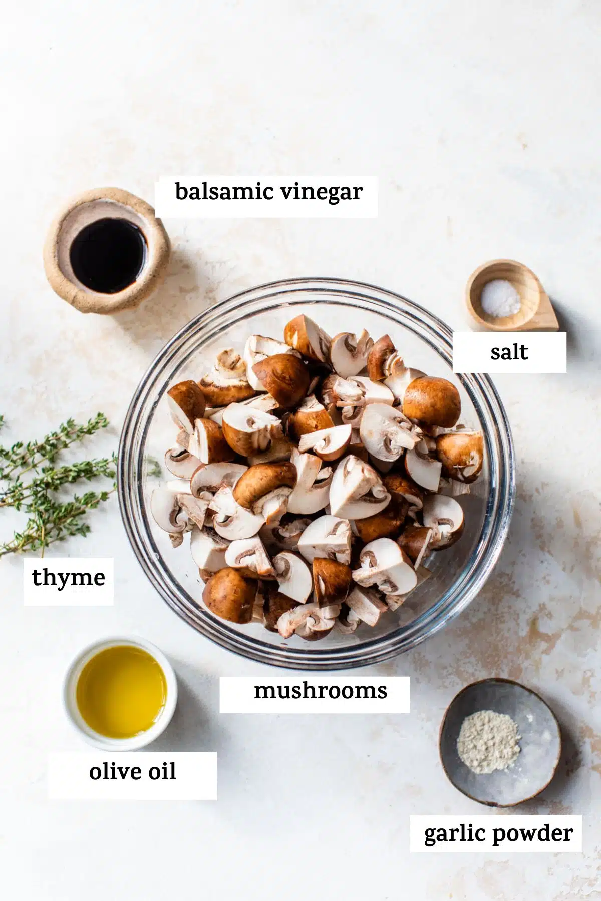 all ingredients listed: thyme, olive oil, mushrooms, balsamic vinegar, salt, and garlic powder