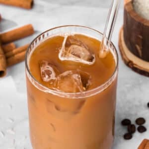 overhead view of an iced horchata latte in a glass.