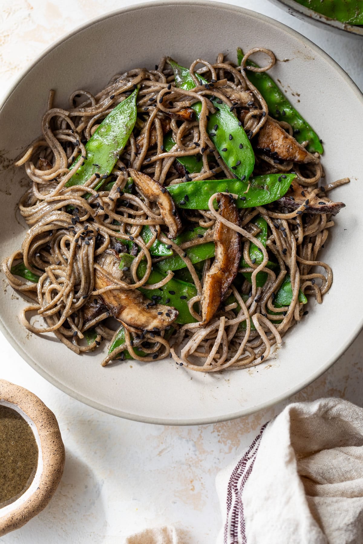 overhead view of a bowl of Black Sesame Tahini Noodles.