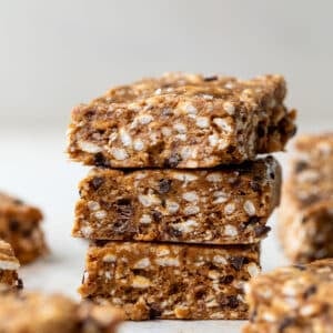 side view of a stack of 3 Puffed Rice Protein Bars.