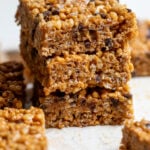 Side view of a stack of 3 Healthy Peanut Butter Rice Crispy Treats.