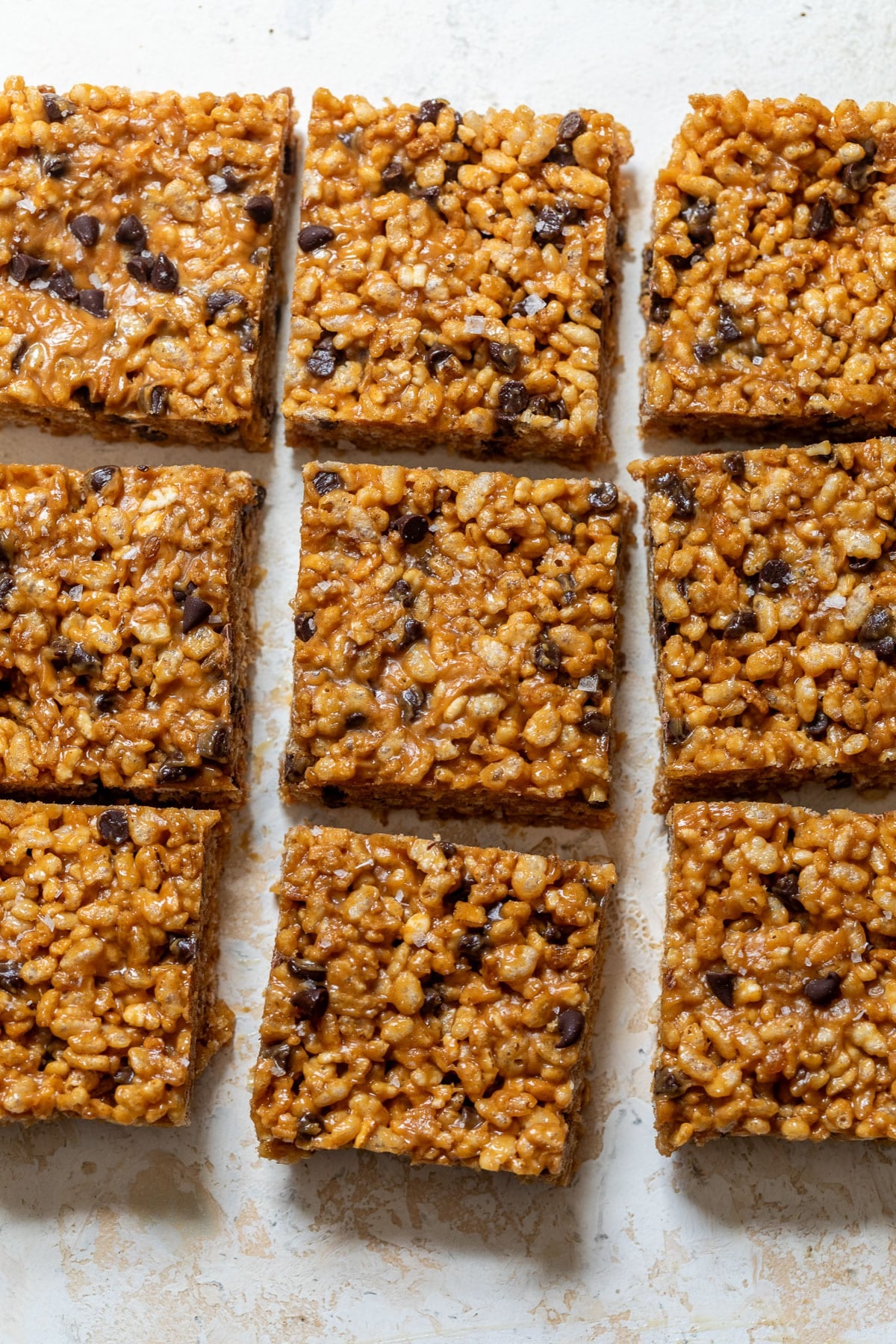overhead view of sliced Healthy Peanut Butter Rice Crispy Treats in rows.