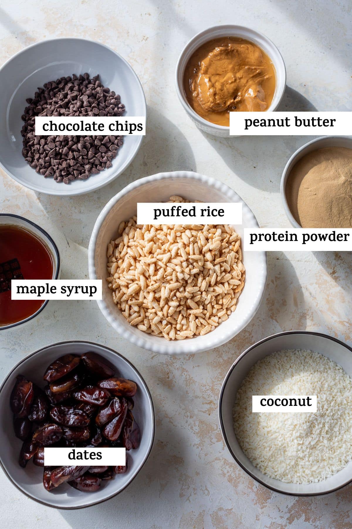 overhead view of the ingredients for puffed rice protein bars with labels.