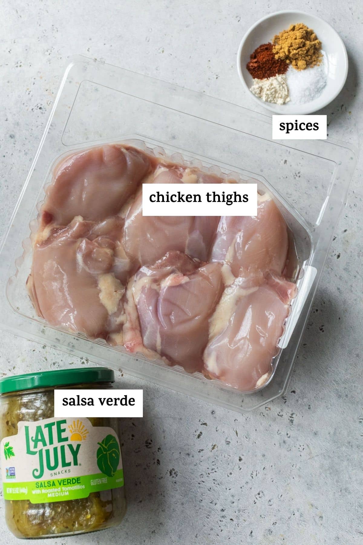 overhead view of the ingredients for salsa verde chicken with labels.