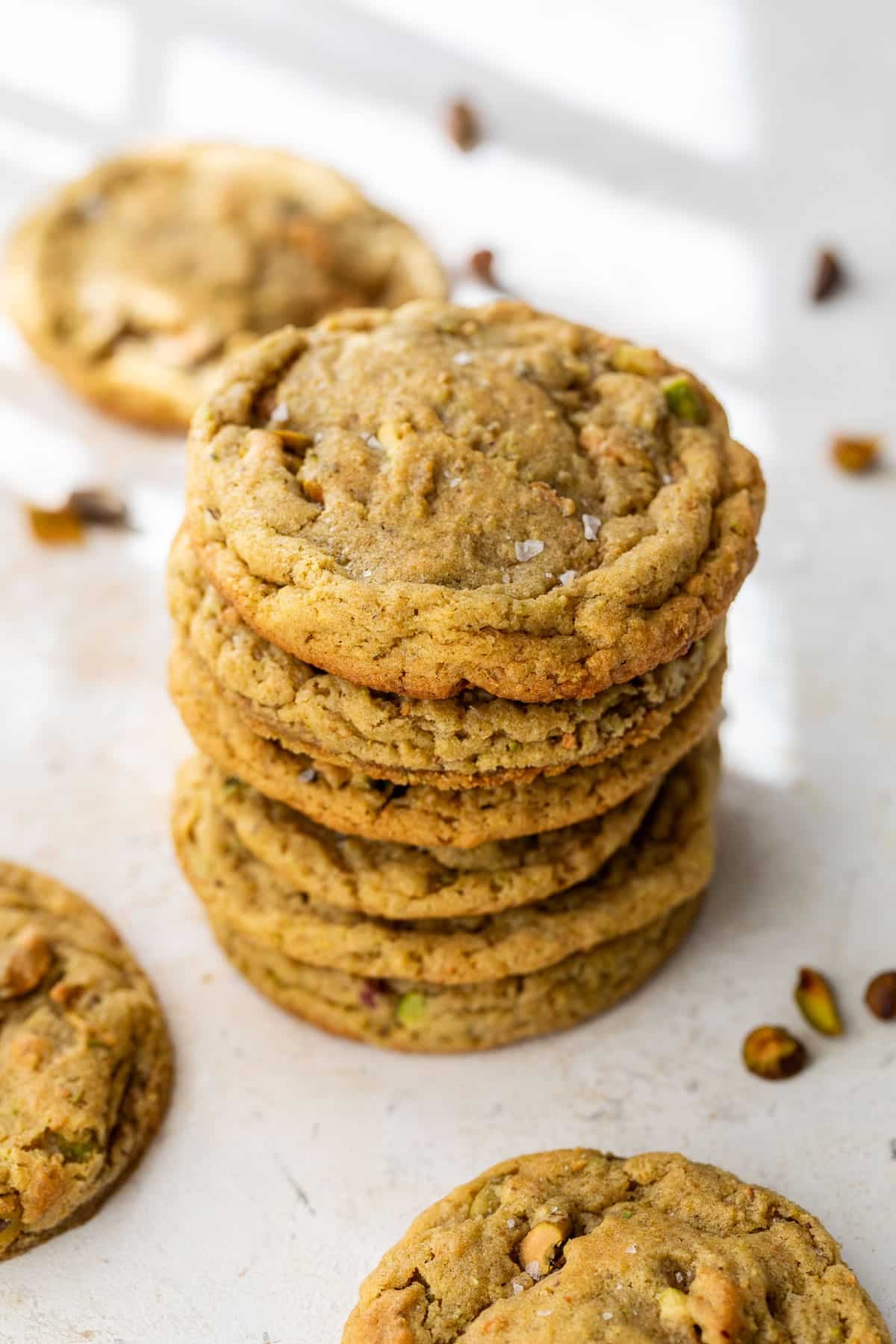 side view of a stack of pistachio cookies.